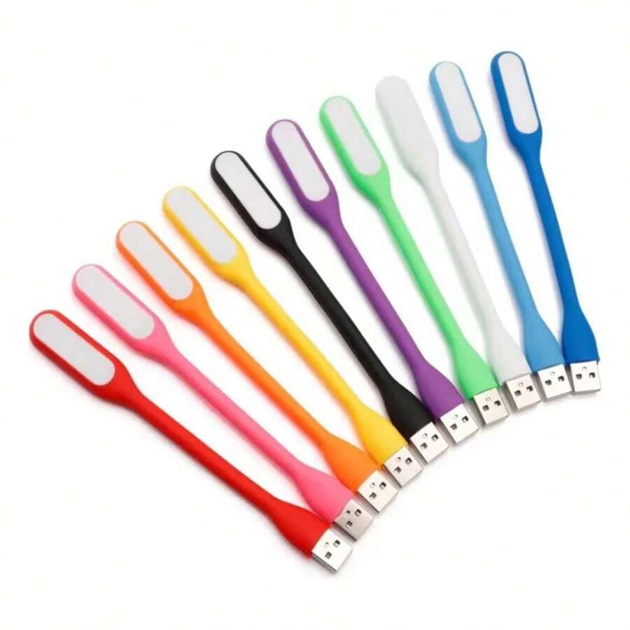 50 PZ DE Lámpara portátil USB flexible de diseño moderno, práctica y ligera, ideal para iluminar tu computadora portátil, teclado, área de trabajo, lectura o espacios reducidos sin necesidad de enchufes adicionales; su cuello de silicón suave y moldeable permite ajustar la dirección de la luz con facilidad, proporcionando un ángulo de iluminación perfecto en cualquier entorno; disponible en una amplia gama de colores vibrantes que aportan un toque alegre y personalizable, se conecta fácilmente a cualquier puerto USB de laptop, power bank o adaptador; cuenta con luz LED de bajo consumo que ofrece una iluminación clara y uniforme, sin parpadeos ni reflejos molestos, perfecta para estudiar, trabajar o leer durante la noche; su tamaño compacto la hace ideal para transportar en mochilas, bolsos o estuches, convirtiéndola en una herramienta versátil y esencial para estudiantes, profesionales y viajeros que buscan comodidad, estilo y funcionalidad en un solo accesorio portátil y confiable. - Multicolor - Ver 1