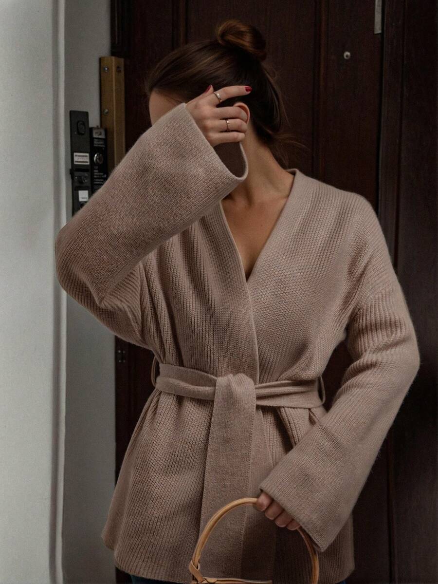 Áo cardigan nữ tay dài, màu trơn, họa tiết sọc dọc, dáng rộng, cổ chữ V, thắt eo, chất liệu nhẹ, thích hợp cho mùa xuân, thu và đông.