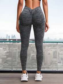 Leggins deportivos de yoga para mujer con pliegues en V en la espalda - Elevación de glúteos y control abdominal, tejido elástico 4D suave, ideal para gimnasio, running y pilates - Gris Oscuro - Ver 3