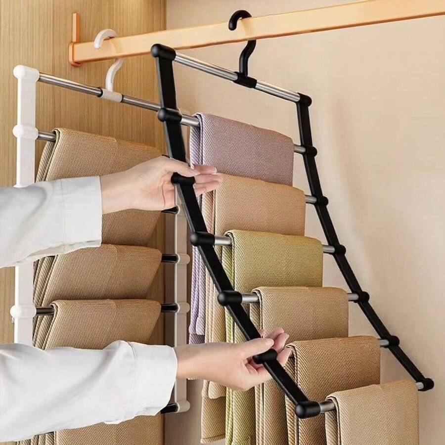 5/7层折叠裤架 - 不锈钢衣橱收纳架，适用于牛仔裤、紧身裤和休闲裤，多层设计，方便收纳；无痕不锈钢材质，经久耐用，美观易折叠。