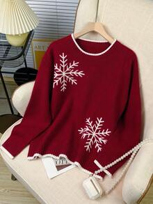 Suéter de punto casual con cuello redondo y estampado de copos de nieve rojos navideños para mujer