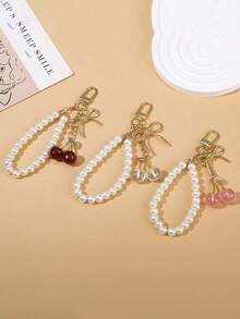 1个女士新款樱桃蝴蝶结金属钥匙扣，时尚蝴蝶结配饰，简约ins风包包挂饰 - 彩色 - 查看 2