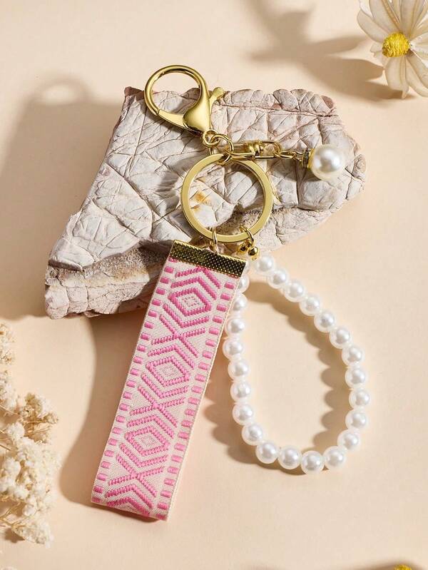 1 pièce de porte-clés avec perle de faux, breloques de sac, porte-clés, porte-clés avec motif jacquard brodé tressé à la mode (Remarque : ***Le tissu tressé ne peut pas être tenu à la main, la chaîne de perles est élastique et peut être tenue à la main***), pendentif de sac de dame exquis, porte-clés ruban à la mode pour dames, porte-clés universel