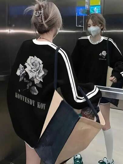女士休闲黑白条纹字母玫瑰印花圆领长袖宽松舒适卫衣，适合休闲、居家、日常穿着、时尚、学生等场合，春季百搭。