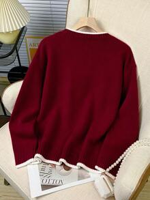 Suéter de punto casual con cuello redondo y estampado de copos de nieve rojos navideños para mujer