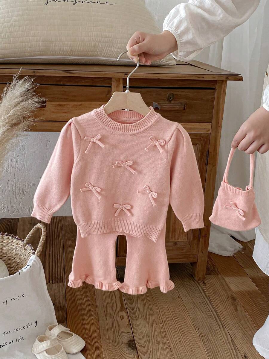 女婴优雅撞色蝴蝶结针织上衣和纯色长裤套装，秋冬季