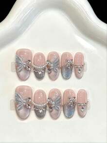 10片装短款椭圆形手工美甲贴片，适合派对和日常佩戴，手绘蓝色美甲，【蓝色蝴蝶之恋】营造出仙气飘飘的蓝色氛围，搭配猫眼蝴蝶锆石，椭圆形美甲，闪亮耀眼，易于佩戴。10片装Y2K手工美甲贴片，适合女孩和女士参加节日派对和日常佩戴。 - 藍色 - 查看 9