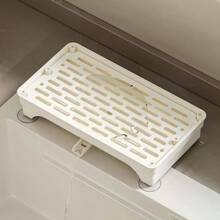1个节省空间的带滴水盘的海绵架 - 坚固的塑料水槽收纳架，内置排水孔，无需钻孔，可拆卸可清洗的储物格，适用于厨房和浴室 - 可放置海绵、毛巾、刷子等
