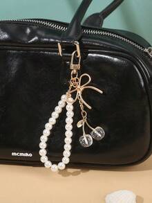 1个女士新款樱桃蝴蝶结金属钥匙扣，时尚蝴蝶结配饰，简约ins风包包挂饰 - 彩色 - 查看 16