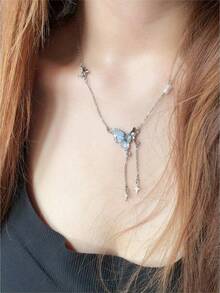 1pc Butterfly Tassel Necklace Designed For Modern Women Who Appreciate Light Luxury And Korean Style Aesthetics This Elegant Piece Features A Delicate Butterfly Pendant With A Flowing Tassel Creating A Captivating Movement That Adds A Touch Of Femininity To Any Outfit Crafted With Hypoallergenic Materials And An Adjustable Chain It Ensures Comfortable All Day Wear Without Irritating Sensitive Skin The Waterproof And Tarnish Resistant Properties Maintain Its Radiant Appearance Through Continuous Wear Making It Perfect For Daily Activities Whether Youre Attending A Party Wedding Music Festival Or Enjoying A Beach Vacation This Necklace Effortlessly Enhances Your Style Its A Thoughtful Gift For Girlfriend Mom Daughter Or Friends Celebrating Special Occasions Like Birthdays Anniversaries Or Holidays With Its Timeless Design And Meaningful Symbolism