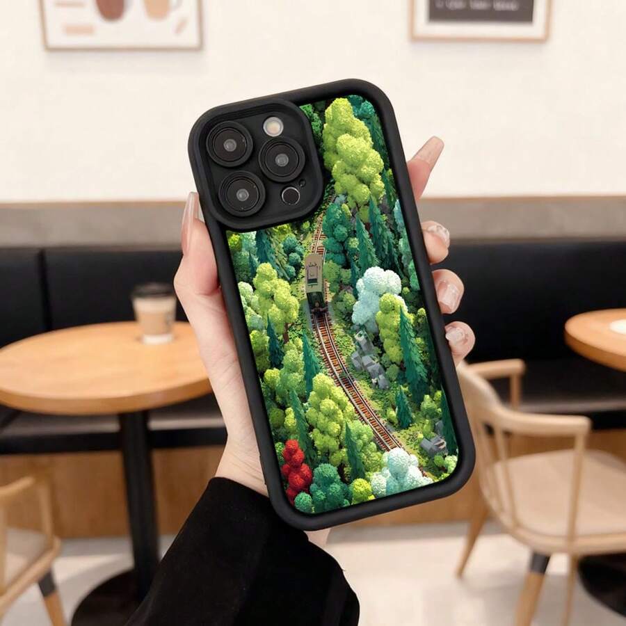 Cubierta de telefono con borde negro diseño de bosque y tren verde para iPhone 14 Pro Max ideal para uso diario en cafeterias y espacios urbanos Aplicable a los teléfonos de la serie Apple y Galaxy - Café integral - Ver 1