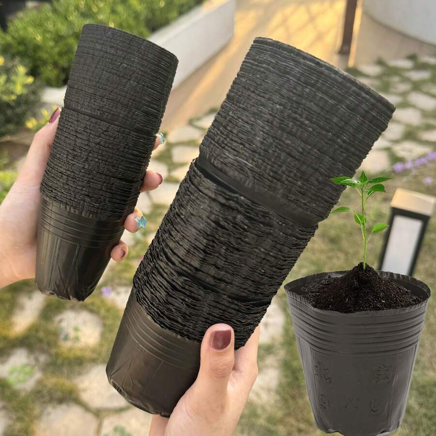 100/300个透气黑色育苗盆,耐用软塑料种植杯,带排水孔,可重复使用轻便植物容器,适合种子发芽和植物繁殖,是室内外家庭花卉、蔬菜、幼苗和绿植栽培的必备园艺用品 - 黑色 - 查看 1