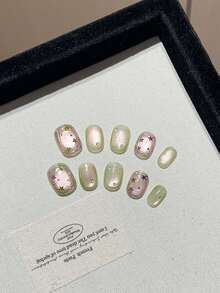 1 Set Of 10 Pure Handmade Wearable Nails, Low-Key, Light Luxury, Dark Green, Cat Eyes, Water Droplets, Stars, High-Quality, Pure Handmade, Detachable Nail Patches Suitable For Women's Daily Wear And Party Wear. Comes With Two Pieces Of Jelly Glue And A Rubbing Strip For Easy Freedom In Nail Art