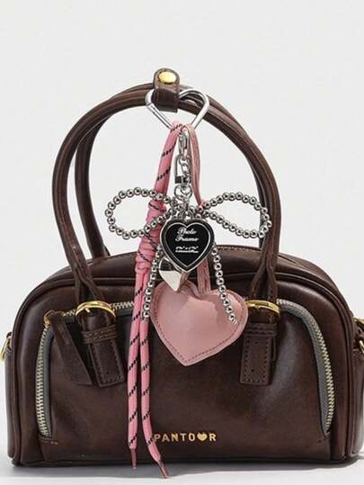 1个少女风银色珠子蝴蝶结包包挂饰，皮革心形钥匙扣吊坠，精美派对礼物