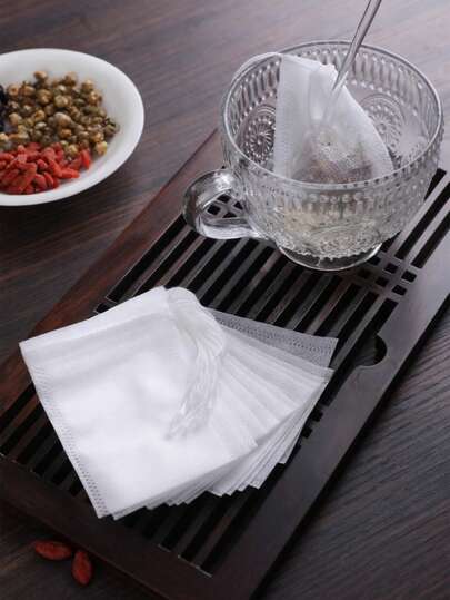 The Disposable Kitchen Bags With Drawstring, Made Of High-Quality Non-Woven Fabric, Can Be Used For Filtering Tea Leaves, Brewing Tea, Making Soup, Filtering Spices, Foot Bath Compresses, Etc.