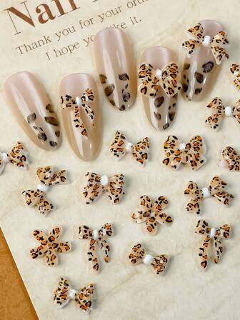 30 piezas Encantos de uñas con lazo de estampado de leopardo 3D - 30 piezas Encantos de arte de uñas de leopardo 3D para manicuras elegantes, accesorios de manicura, encantos con acabado brillante, decoraciones de arte de uñas DIY para otoño e invierno para mujeres y niñas (elegante, sin olor) Suministros para uñas Uñas Gemas para uñas