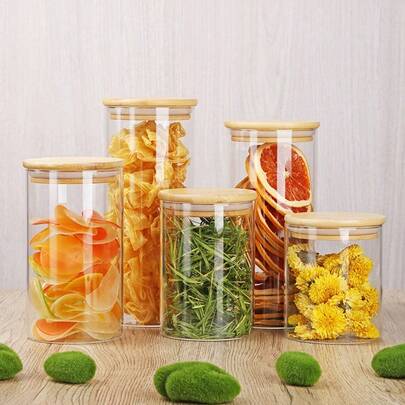 高硼硅玻璃密封储物罐，适用于存放谷物、麦片、干果、橘皮和茶叶。直筒圆柱形设计，配竹制盖子，简约透明，是家居收纳的理想之选。也是圣诞礼物、厨房用品和食品储存容器的完美选择。