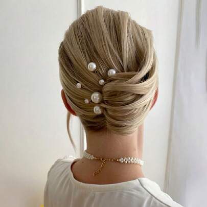 一套新娘发夹，饰以仿珍珠，甜美摄影棚道具