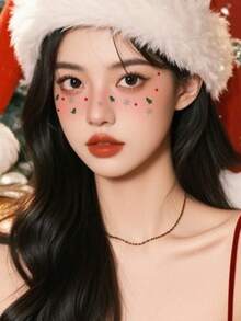 Một hình xăm trang trí mặt tạm thời chủ đề Giáng sinh - Hình cây thông Noel, ngôi sao, bông tuyết dễ thương, giữ được 3-5 ngày. - Nhiều màu - Xem 5