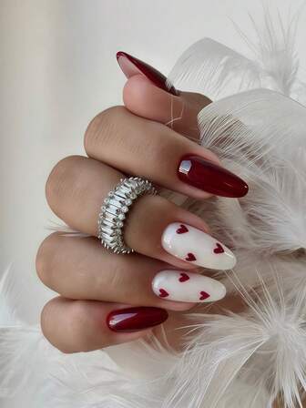 24 pegatinas de uñas con forma de almendra, diseño minimalista de corazones burdeos, uñas postizas de cobertura completa, que aportan un ambiente romántico para mujeres y niñas. Incluye 1 hoja de pegatinas adhesivas y 1 lima de uñas mini, adecuado para fiestas, citas y uso diario. Uñas postizas de gel de gelatina enviadas al azar.