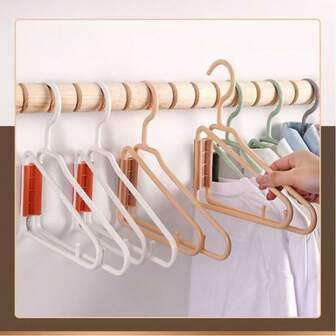 5/10件装多功能折叠衣架，节省空间，便携易用，适用于学生宿舍、小型公寓、家庭、旅行和商务出行；可折叠、防滑、轻便，是衣柜、衣橱、洗衣房、行李箱和房车的理想收纳工具；非常适合长途旅行、返校宿舍搬家、节日送礼、圣诞节礼物以及日常衣橱整理。