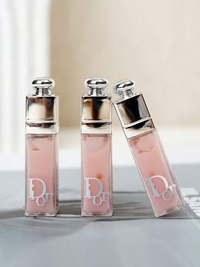 Christian Dior 旅行装丰唇蜜 001 粉色旅行装（玻尿酸丰唇蜜）滋养轻盈唇蜜，提供保湿和亮泽妆效，是女性旅行和日常使用的理想之选 2毫升/0.07盎司