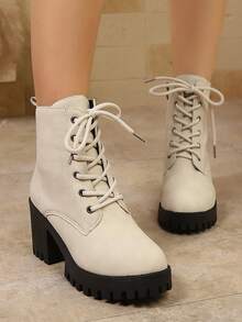 时尚舒适的白色踝靴，采用厚实防滑绒面革制成，适合秋冬季节，室内外均可穿着。 - 杏色 - 查看 2