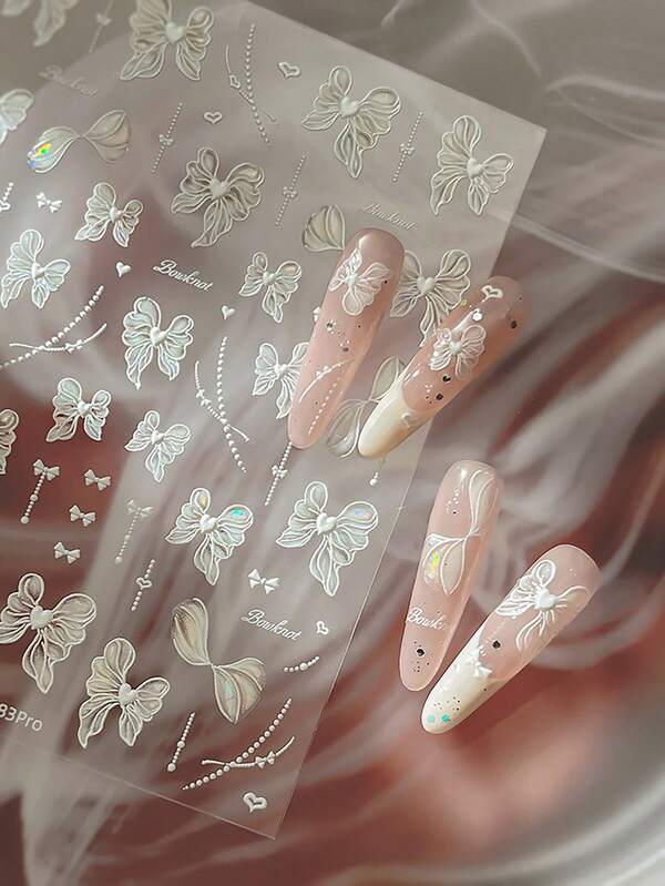 قطعة واحدة من ملصقات فن الأظافر بشريط أورجانزا أبيض، ديكورات صالون الأظافر DIY مع قلوب ثلاثية الأبعاد مرصعة بأشرطة، مناسبة للمبتدئين وهواة فن الأظافر. إنها مثالية لإنشاء ديكورات أظافر راقية وأنيقة للمناسبات والمواعيد والحفلات والاحتفالات والعروض. إنها عنصر ديكوري مثالي للنساء اللواتي يحببن الجمال لإظهار سحر أظافرهن.