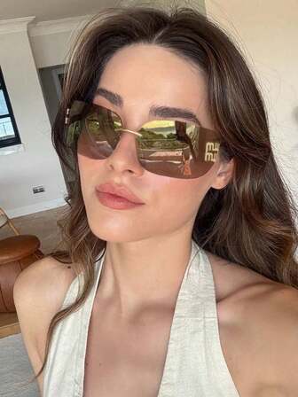 1副弧形一体式无框女士时尚眼镜，Y2K复古高端眼镜