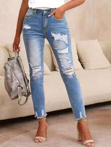 Women's Distressed Skinny Jeans - With Ripped Details And Frayed Hem, Mid-Rise Stretchy Fit, Casual & Stylish - Medium Wash - View 1