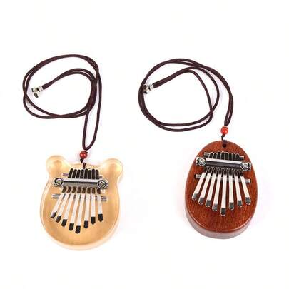 Eight-Tone Thumb Piano Hanging Piece Toy Thumb Piano Pendant Portable Musical Instrument Music Store (Colors May Vary)