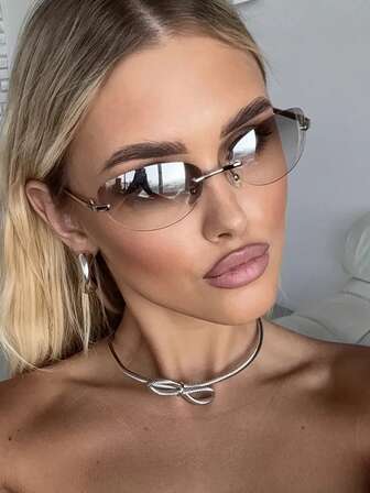 Gafas de moda ovaladas sin marco retro, estilo callejero chic de metal futurista Y2K