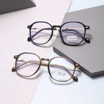 Women's Fashion Retro Non-Prescription Glasses. The Frame Is Mainly In Black, Paired With Gold-Colored Temple Decorations, Creating A Strong Color Contrast And A Sense Of Quality. The Round Frame Design Adds A Retro Charm, While Still Maintaining A Modern Fashionable Feel. The Lenses Have A Slight Blue Tint, Which May Have Blue Light Filtering Function.