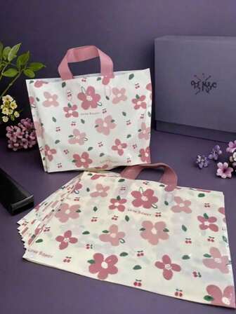 50 PIEZAS/Paquete Bolsas de regalo con flores de melocotonero y asas rosas - Plástico resistente, ideal para el Día de San Valentín y tiendas de ropa, diseño romántico para bolsos, decoración de San Valentín | Para bodas, celebraciones de bodas, cumpleaños, Navidad, Halloween y bolsas de regalo del Día de San Valentín