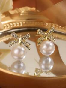 鑽石蝴蝶結＆仿珍珠設計耳釘