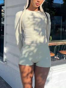 Top à manches longues ajusté de couleur unie et short taille haute, tenue décontractée de sport