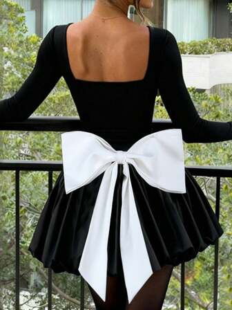 女士黑色优雅蝴蝶结撞色A字连衣裙，适合情人节、新年派对、生日、约会之夜及其他场合。