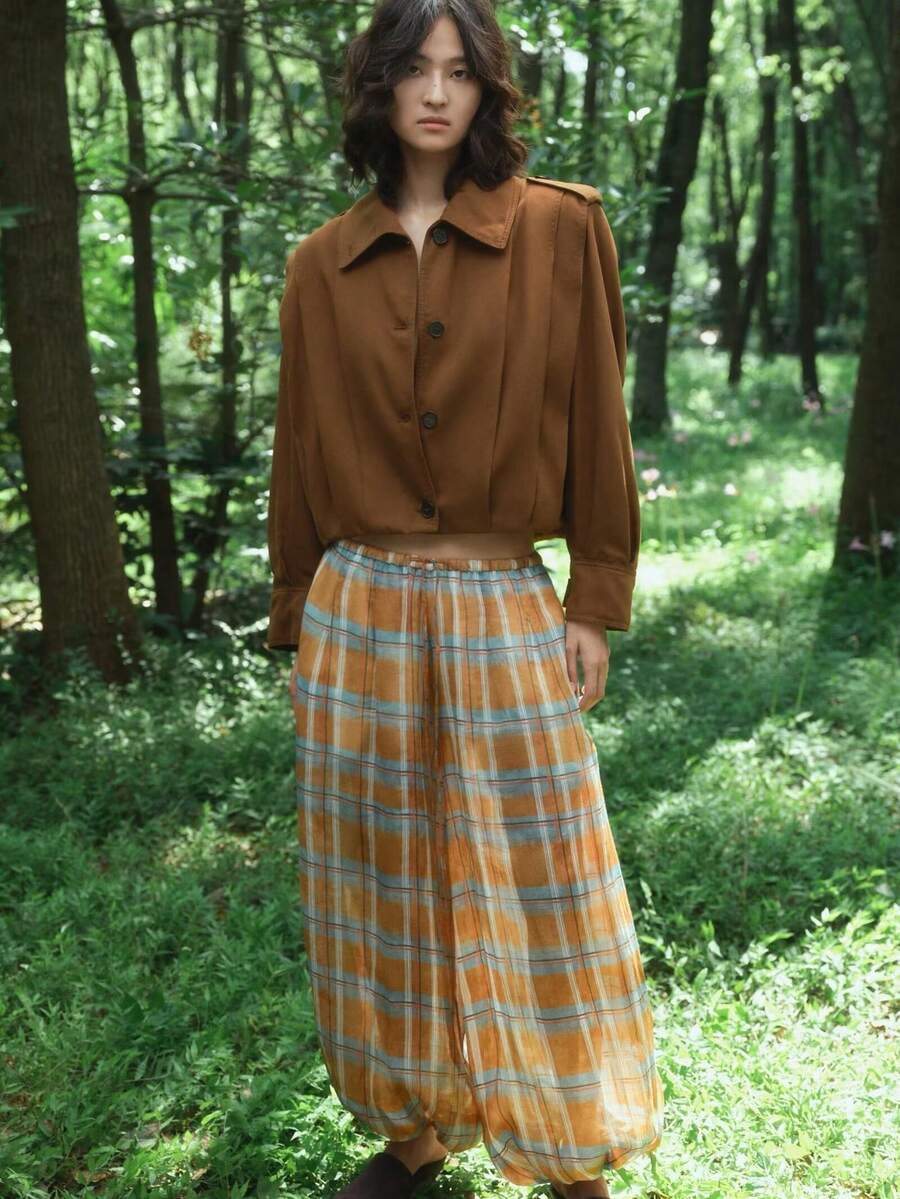 Giacca plissettata di colore unito, stile europeo e americano, di moda e semplice