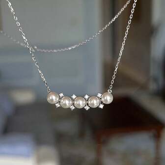 1件S925纯银平衡木纹珍珠吊坠项链，优雅精致，适合日常佩戴，是送给爱人的高品质珠宝礼物。