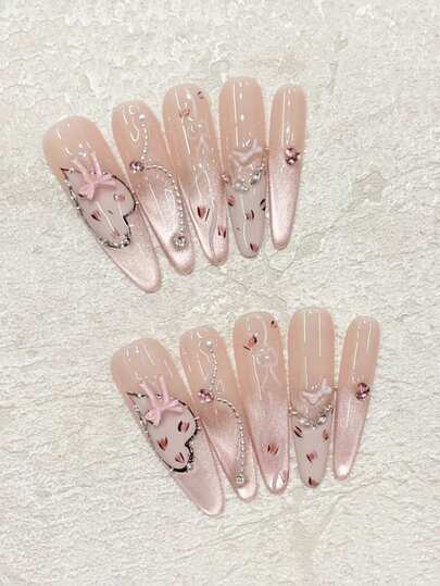 10片装Y2K可爱豹纹法式美甲套装，手绘粉色豹纹图案，饰以心形链条、蝴蝶结和闪亮猫眼点缀，可重复使用的美甲贴片，适合约会、音乐会、送礼等场合。