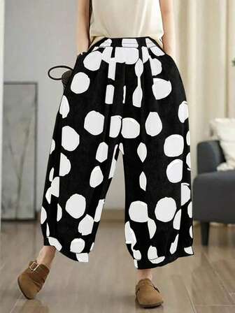 กางเกงขายาวเอวยางยืดพิมพ์ลายจุดสำหรับสตรีไซส์ใหญ่