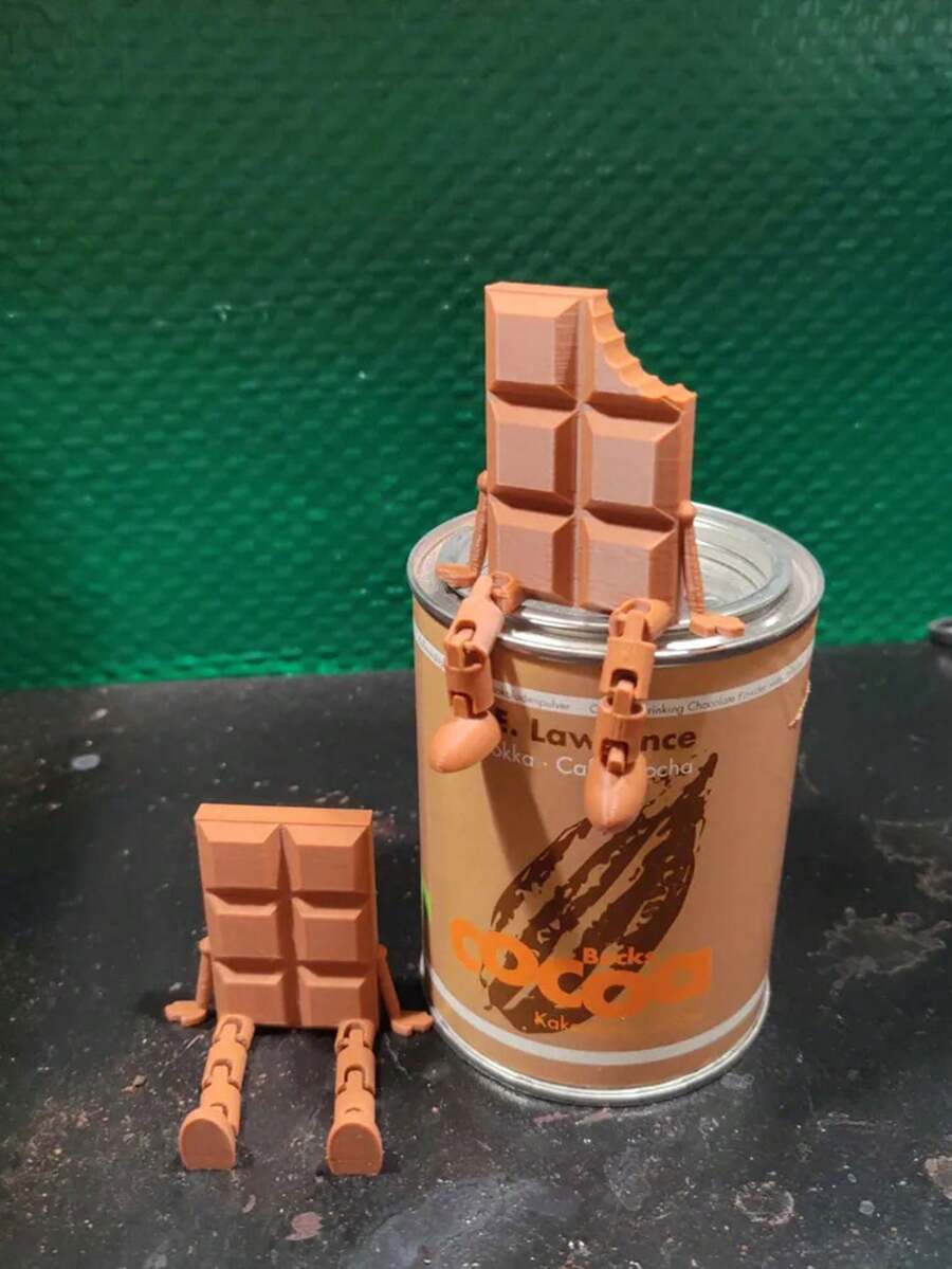 1件3D打印可活动关节巧克力雕塑摆件，咬了一口的巧克力块造型，适合家居和办公室装饰。 - 彩色 - 查看 1