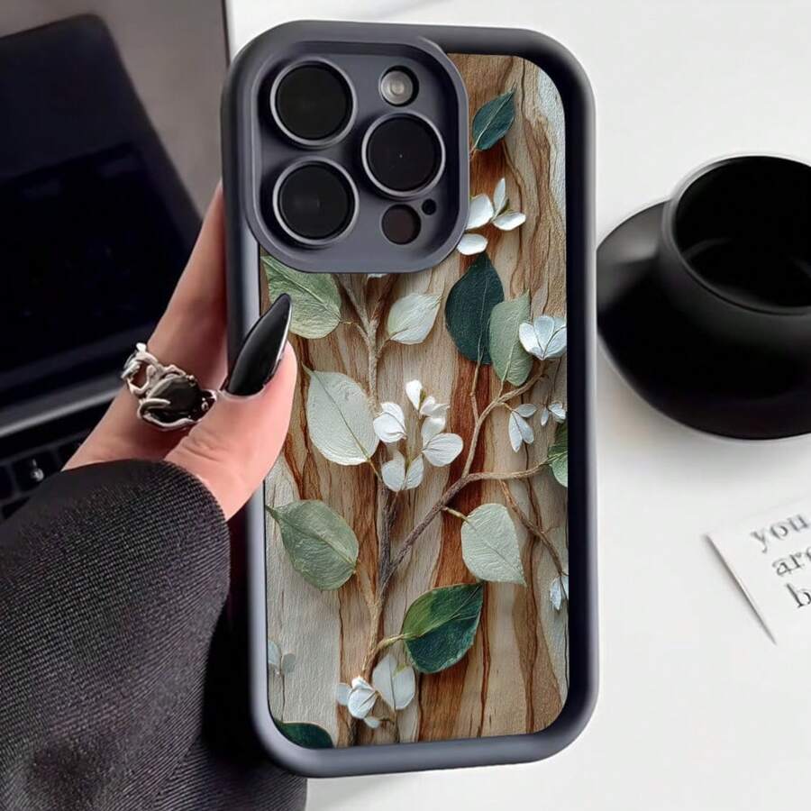 Cubierta de teléfono con borde protector color negro diseño de hojas verdes y flores blancas sobre fondo de madera para uso diario y estilo natural - Blanco - Ver 1