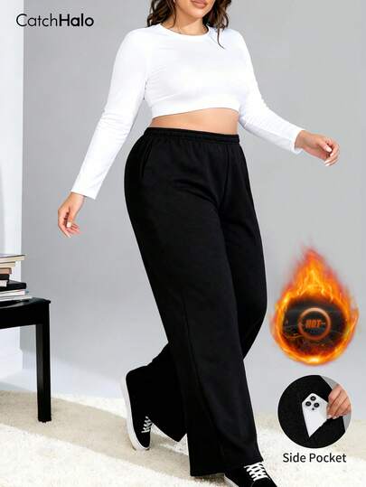 大码阔腿黑色运动裤，侧边口袋，弹性腰带抽绳，保暖内衬，柔软舒适，适合秋冬季健身、日常休闲户外穿着，大码女士宽松保暖裤