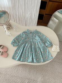 Abito elegante e carino da bambina con colletto arricciato, maniche lunghe e stampa floreale su velluto a coste, adatto per l'autunno/inverno