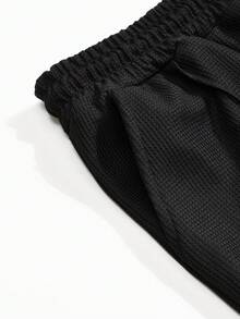 男士纯色华夫格休闲套装，长袖圆领卫衣搭配纯色抽绳长裤，独特舒适的休闲套装，适合男士日常休闲穿着和度假穿着，春秋季节适用。 - 黑色 - 查看 7