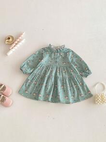 Abito elegante e carino da bambina con colletto arricciato, maniche lunghe e stampa floreale su velluto a coste, adatto per l'autunno/inverno