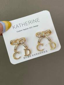 1 Set Fashionable Rhinestone CD Letter Hollow Bow Pendant Earrings, Elegant Jewelry Gift For Women, Suitable For Romantic Valentine's Day