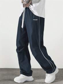 Pantalones de estilo universitario urbano para hombre, otoño  Pantalones holgados y estrechos con cordón y bolsillo de unicolor para hombre, pantalones cargo estrechos para vacaciones largas, regalo para esposo o novio - Azul Marino - Ver 5