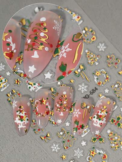 A Christmas Nail Art Sticker With Embossed Hot Stamping Technology, Featuring Elements Such As A Sparkling Christmas Tree, Christmas Wreath, Snowflakes, Etc., Suitable For Personal DIY And Nail Salon Use